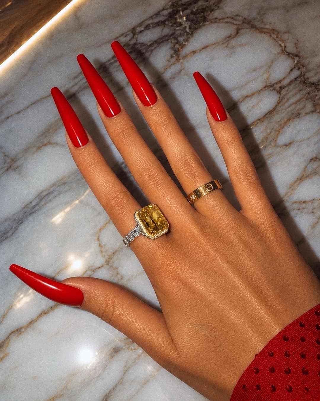 Cartier watch and a yellow diamond, shot close